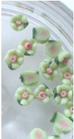 Kwiatki ceramiczne 3mm. - jasno zielone - 20szt.